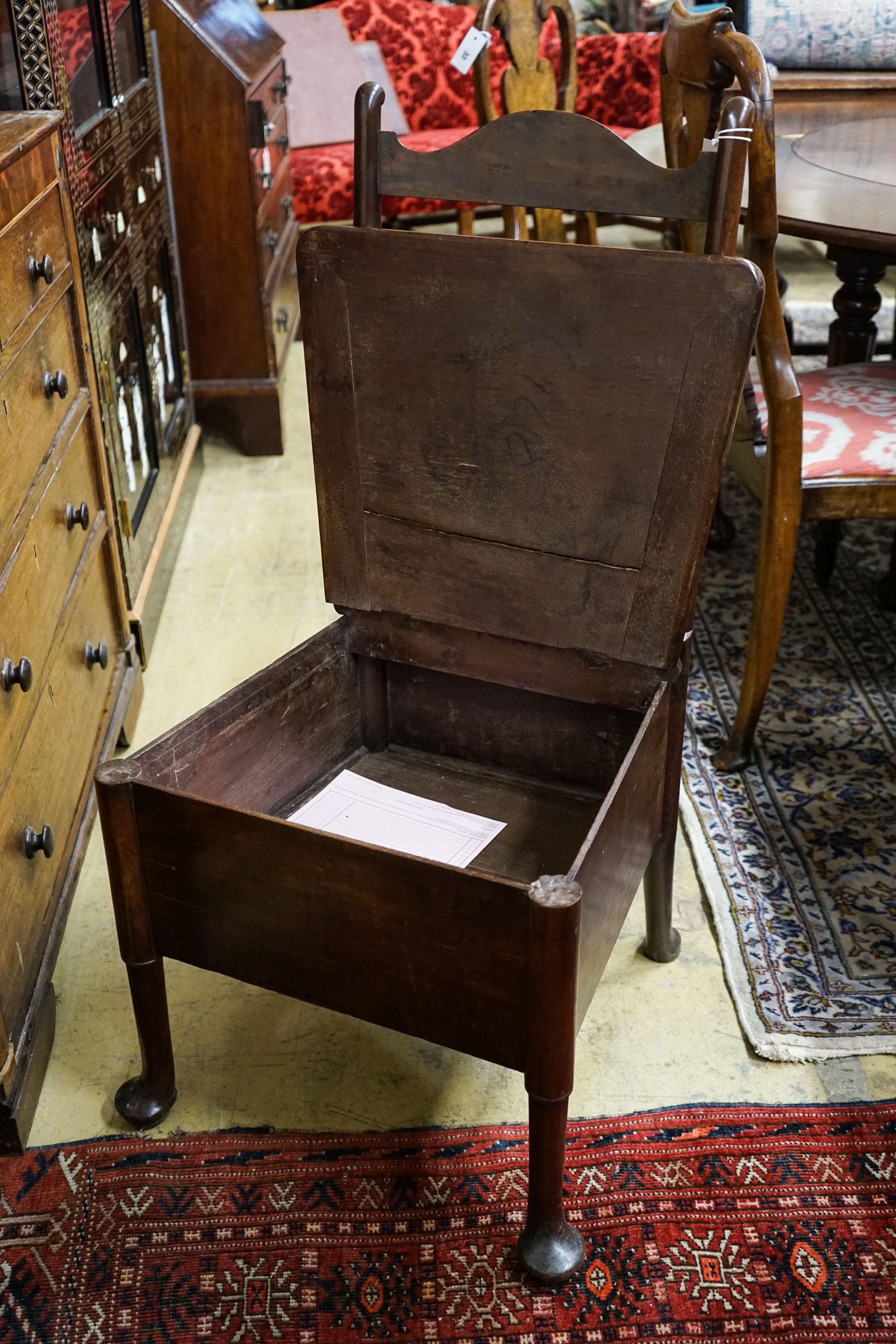 An 18th century mahogany ladderback box seat chair, width 48cm, depth 43cm, height 94cm